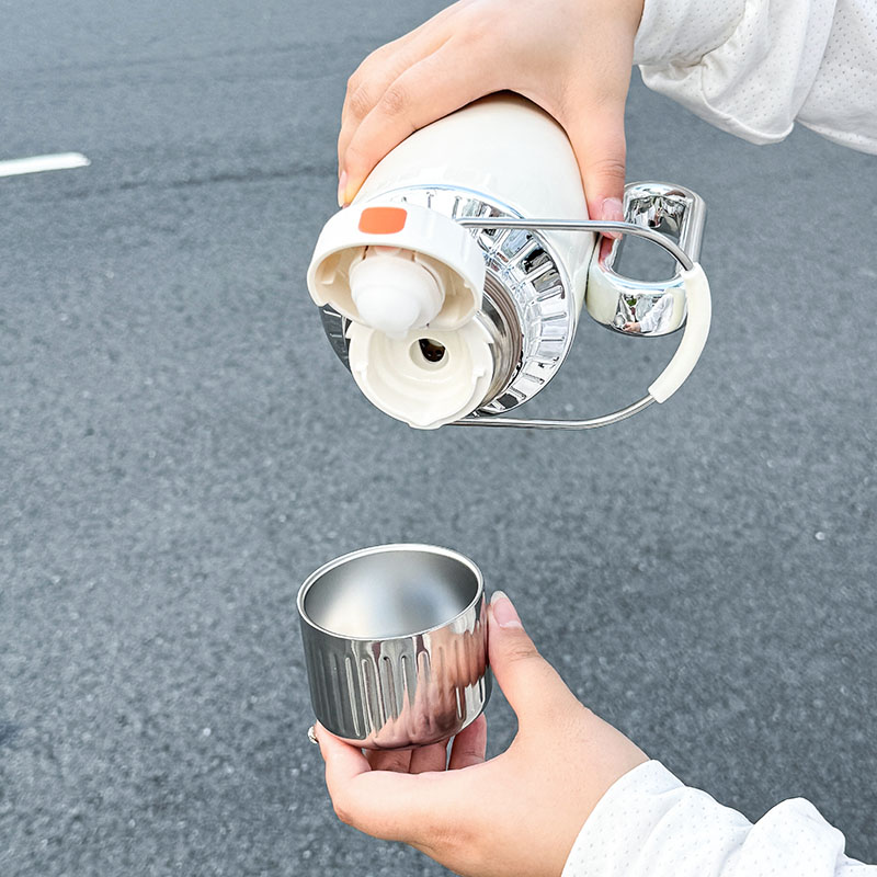 زجاجة ماء معزولة من الفولاذ ال - مراجعة Portable Bottle Warmer وسعره